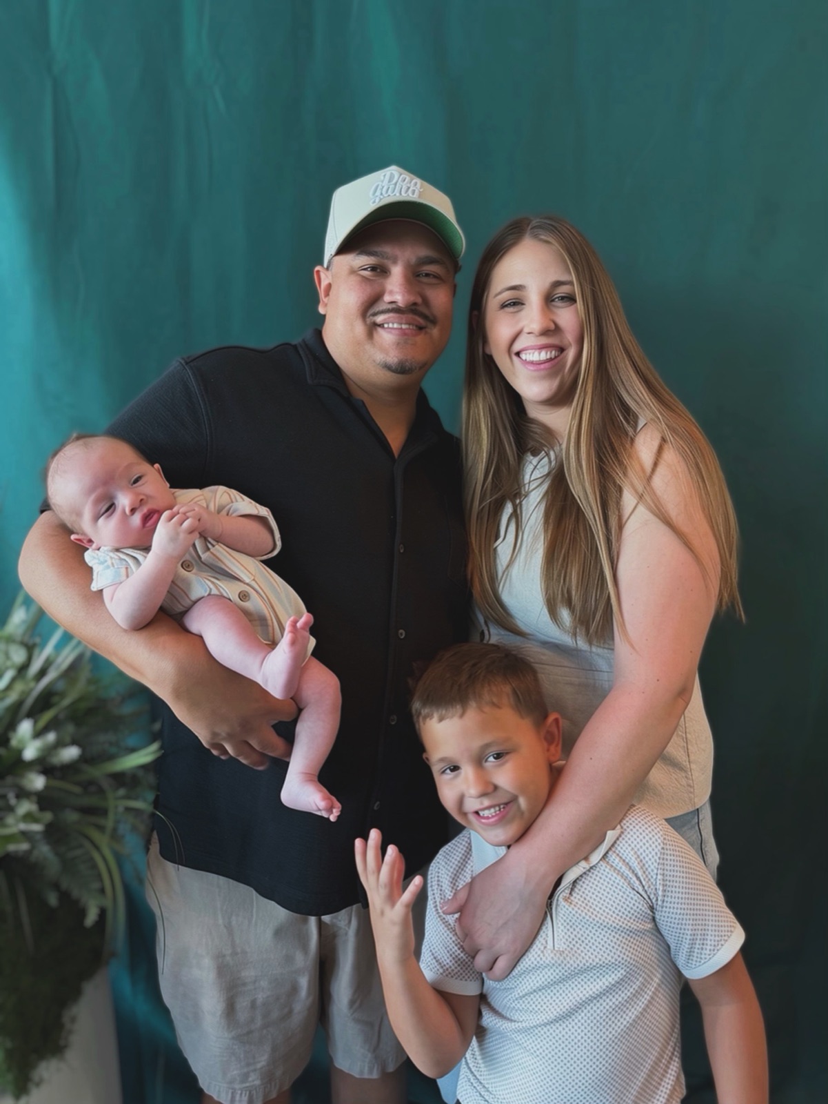 Chris Serra with his wife Aubree and their two sons.